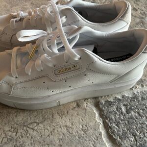 White adidas ladies sz 10 tennis shoes